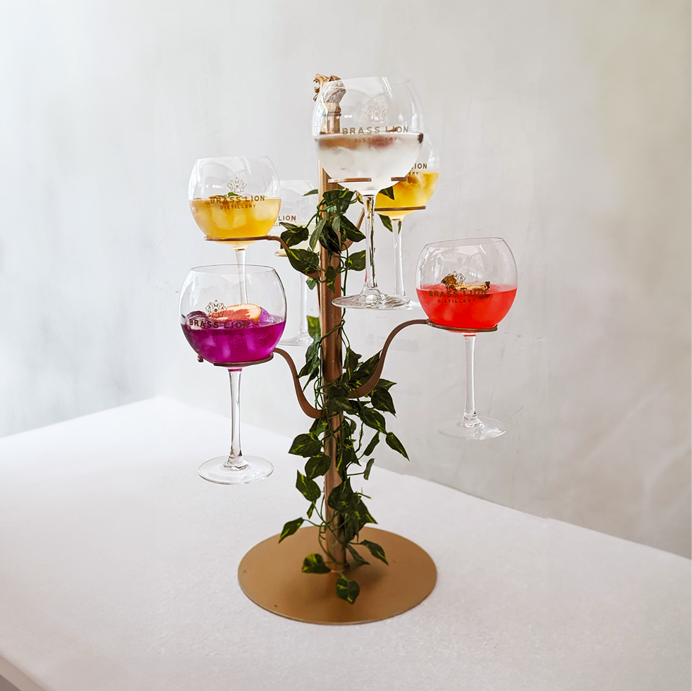 Gin tasting tree featuring six signature Brass Lion gin cocktails in a botanical presentation.