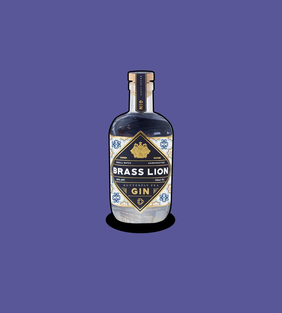 Brass Lion Butterfly Pea Gin bottle on a purple background.